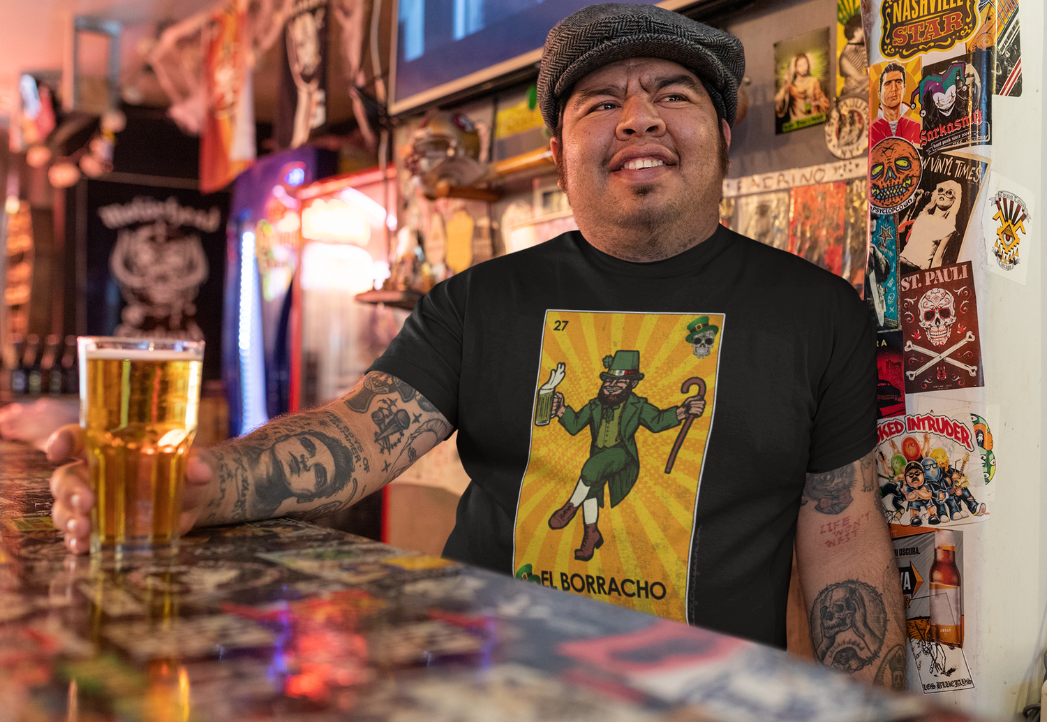 mockup-of-a-tattooed-man-with-a-t-shirt-smiling-at-a-bar-32850_1_1500x